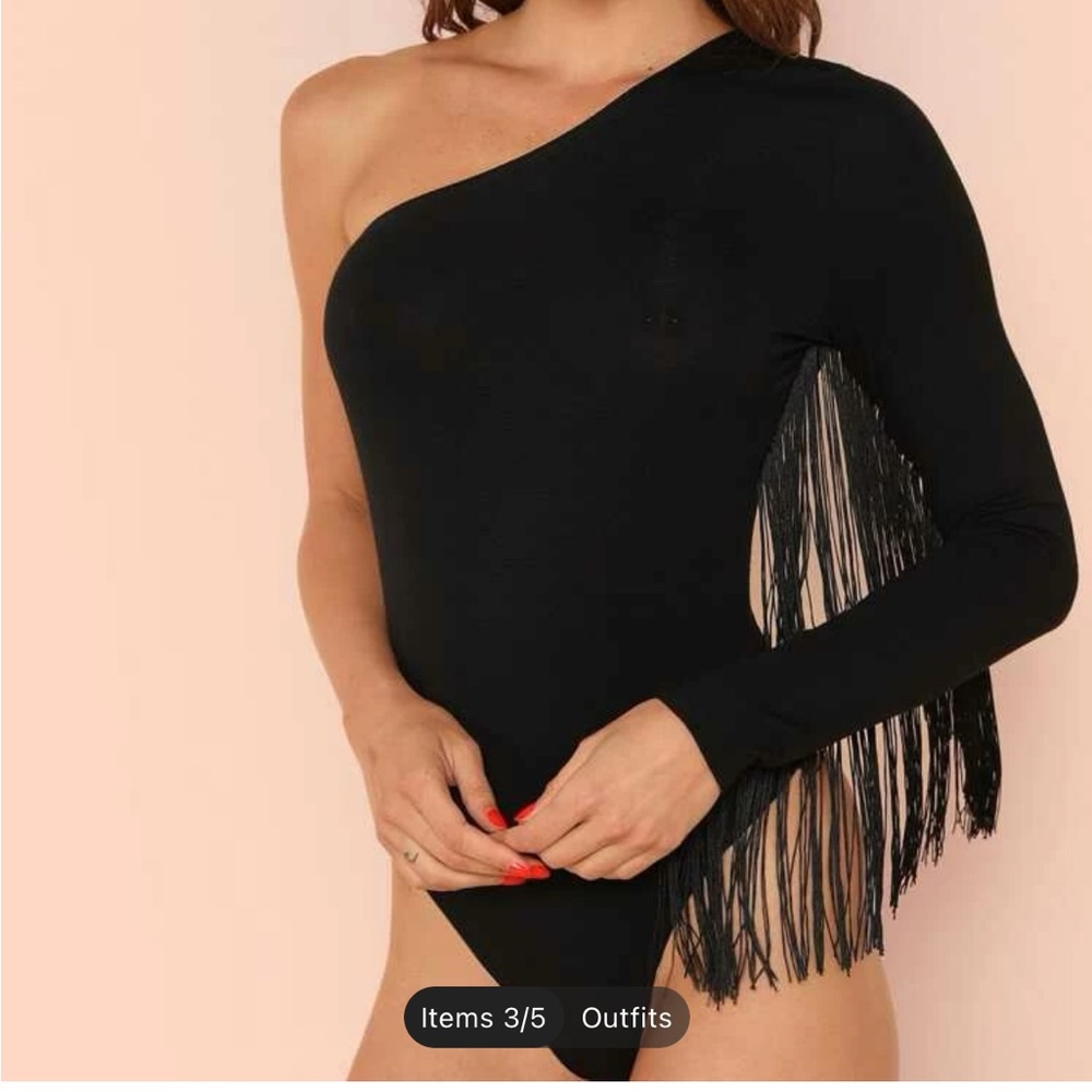 Never worn, one sleeve fringe top!